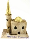 Stuccoed minaret with tip
