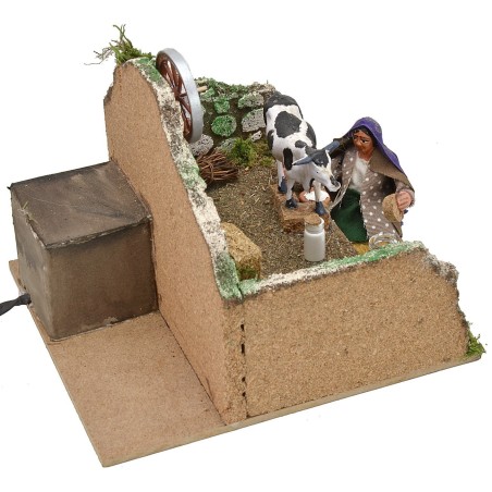 Mungitrice seduta in movimento serie 10 cm Mondo Presepi