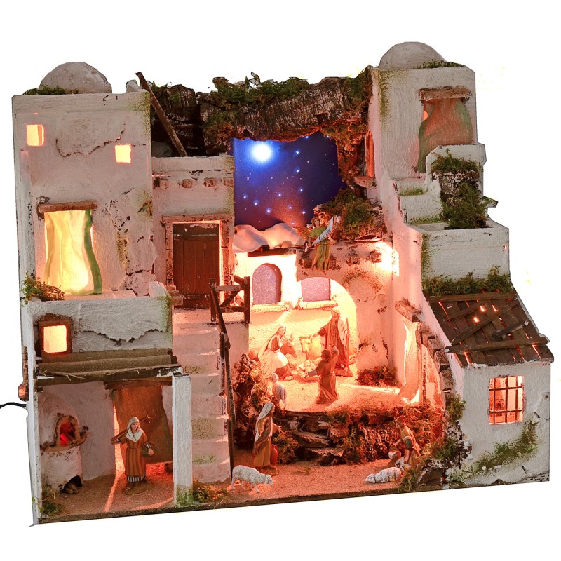 Illuminated Palestinian nativity scene with starry sky, oven and