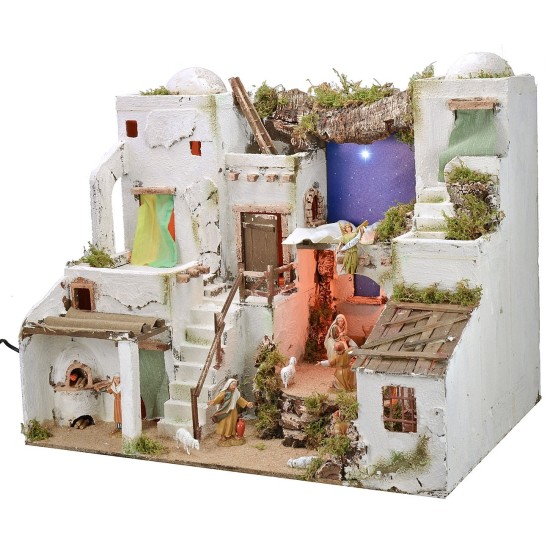 Illuminated Palestinian nativity scene with starry sky, oven and