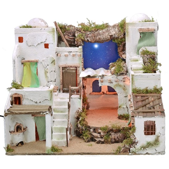 Palestinian Nativity scene illuminated with starry sky and oven cm