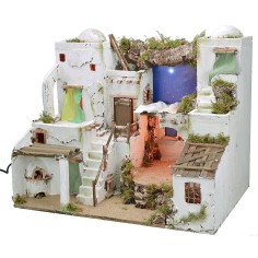 Illuminated Palestinian nativity scene with starry sky and oven 2