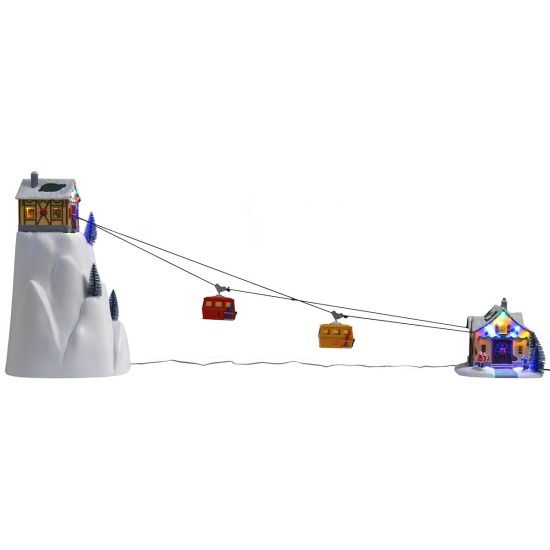Teleférico navideño iluminado con telecabinas en funcionamiento