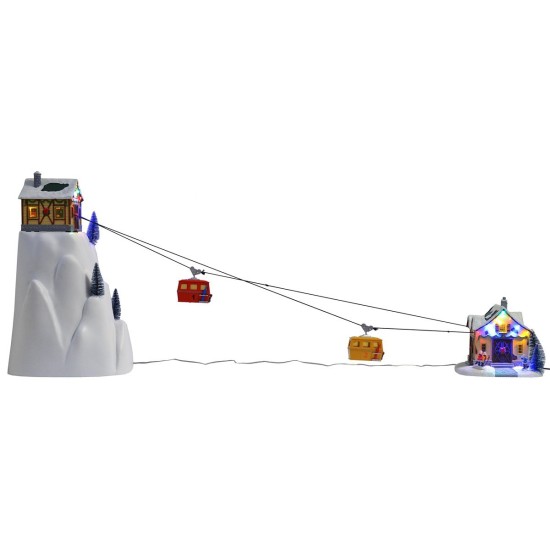 Teleférico navideño iluminado con telecabinas en funcionamiento