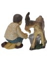 Giovane mungitore di capra in resina serie 9 cm