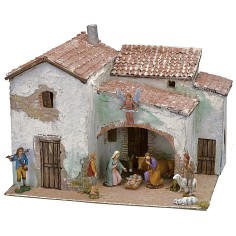 Illuminated stucco village complete with figurines cm 40x30x31 h 2