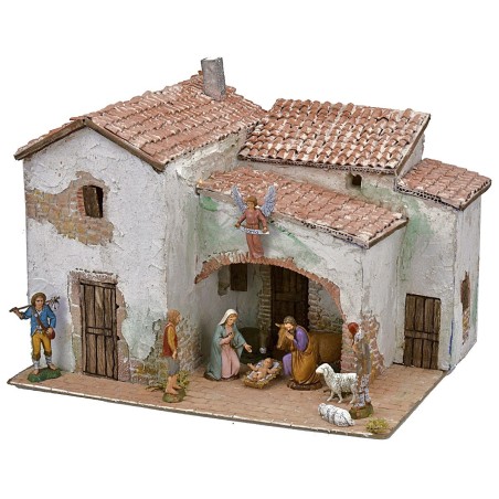 Illuminated stucco village complete with figurines cm 40x30x31 h