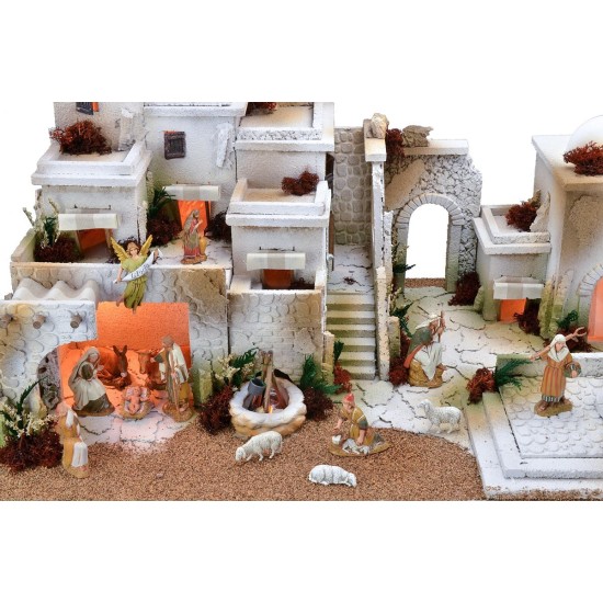 Arabic nativity scene with lights, double tap fountain and fire