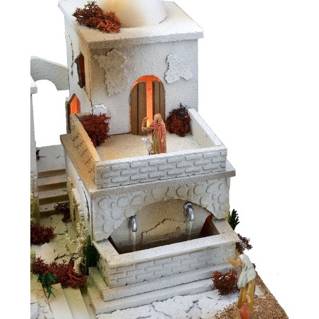 Arabic nativity scene with lights, double tap fountain and fire