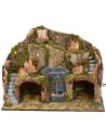 Illuminated nativity scene with working fountain and cave for statues