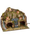 Illuminated nativity scene with working fountain and cave for statues