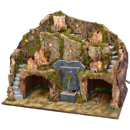 Illuminated nativity scene with functioning fountain and grotto