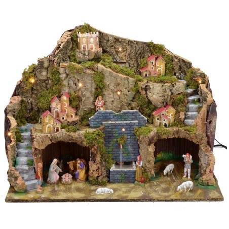 Illuminated nativity scene with working fountain and complete grotto