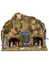 Illuminated nativity scene with working fountain and grotto complete with