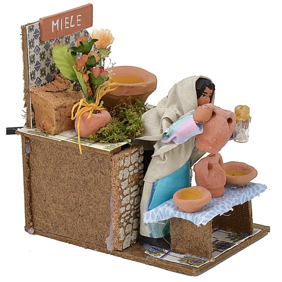 Venditrice di miele in movimento serie 10 cm Mondo Presepi