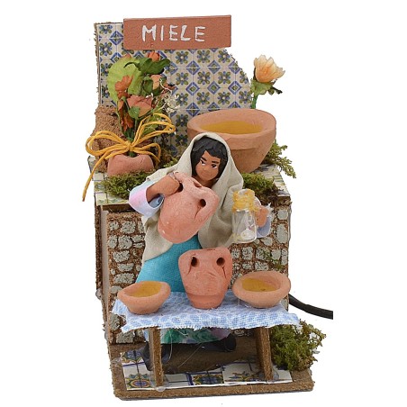 Venditrice di miele in movimento serie 10 cm Mondo Presepi