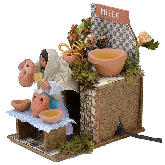 Venditrice di miele in movimento serie 10 cm Mondo Presepi