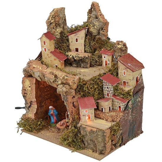Presepe illuminato con paesaggio e grotta completa di Natività