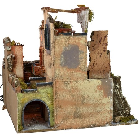 Nativity scene with illuminated village z, working oven and fountain