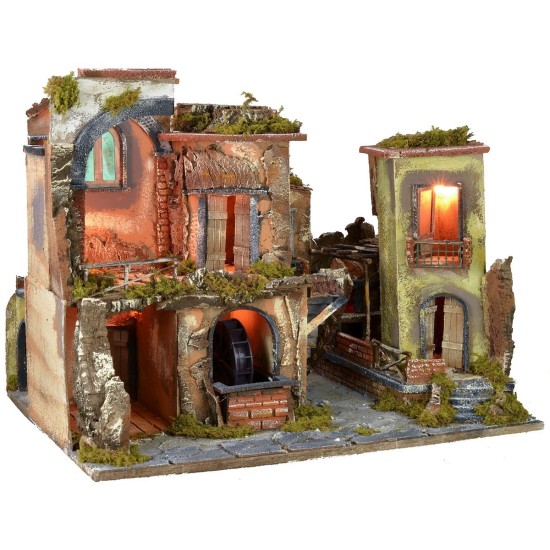 Nativity scene with illuminated village z, working oven and fountain