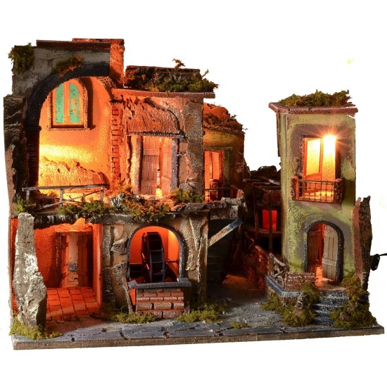 Nativity scene with illuminated village z, working oven and fountain