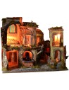 Nativity scene with illuminated village z, working oven and fountain
