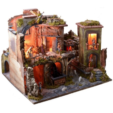 Presepe completo di statue con borgo illuminato, forno e