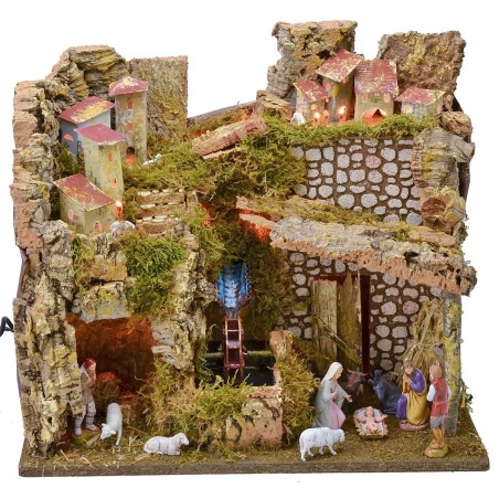 Pueblo iluminado completo con estatuas Landi y molino de agua