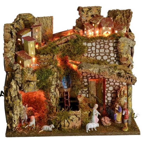 Illuminated village complete with Landi statues with water mill