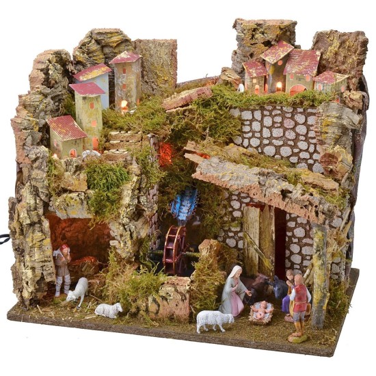 Pueblo iluminado completo con estatuas Landi y molino de agua