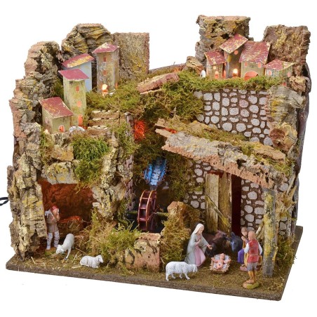 Illuminated village complete with Landi statues with water mill