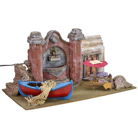 Setting with current-operated fountain, fisherman's boat and