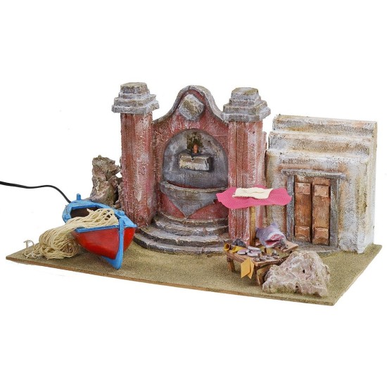 Setting with current-operated fountain, fisherman's boat and