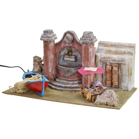 Setting with current-operated fountain, fisherman's boat and