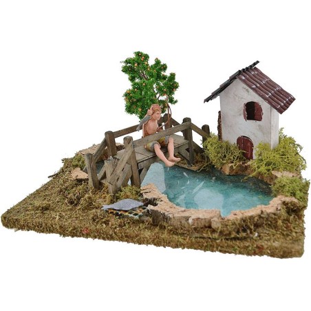 Estanque con efecto profundidad pescador Landi, árbol y casa