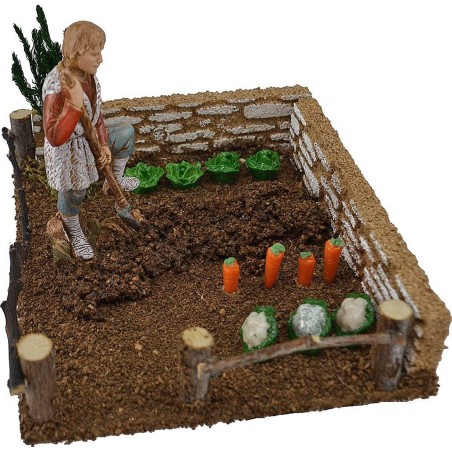 Vegetable garden with farmer landi spade