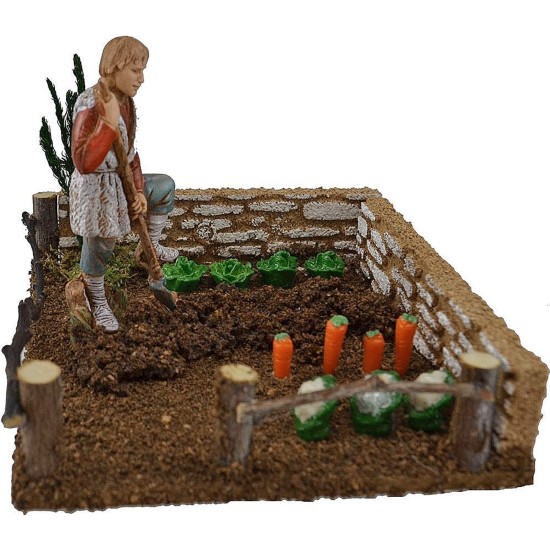 Vegetable garden with farmer landi spade