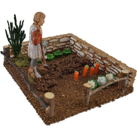 Vegetable garden with farmer landi spade
