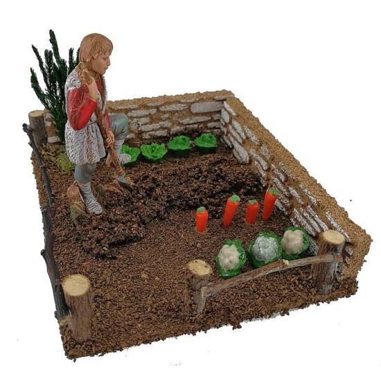 Vegetable garden with farmer landi spade
