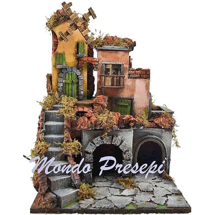 Nativity scene with illuminated village and mill 30x30x40 h.