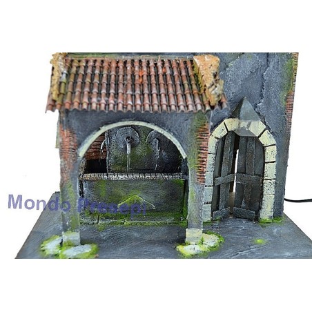 Home with a fountain to 3 outputs of water and streetlight