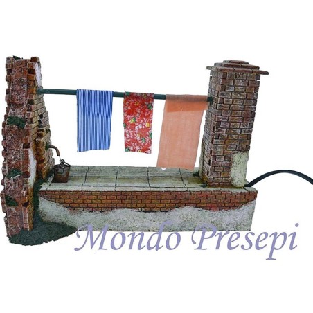 Tendedero goteante con fuente funcional Mundo Pesebres