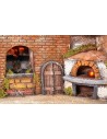 Aldea napolitana iluminada con horno, molino de viento y