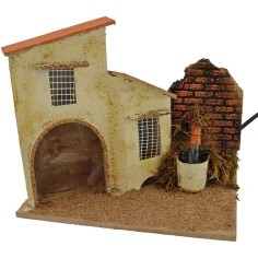Casa con fuente funcionando de 19x13,5x18 cm de altura. Mondo Presepi.