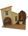 Casa con fuente funcionando de 19x13,5x18 cm de altura. Mondo Presepi.
