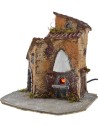 Casa de resina con horno funcional de 19x15,5x22 cm h.
