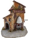 Casa de resina con horno funcional de 19x15,5x22 cm h.