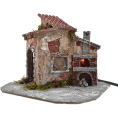 Casa in resina con forno funzionante cm 19x16x15 h. Mondo