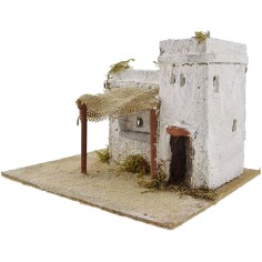 Resin house with curtain cm 22x18x14 h. 2