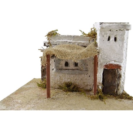 Resin house with curtain cm 22x18x14 h.